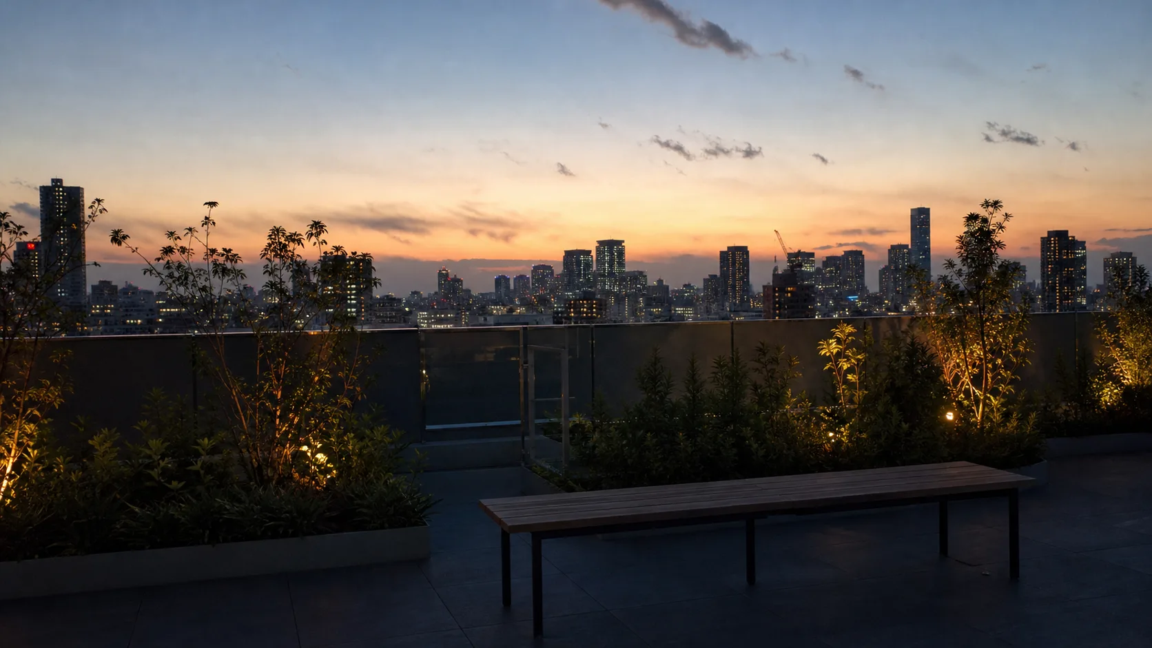 夕方の屋上庭園とベンチのイメージ